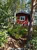 Finnland Mökki am See - rotes Sommerhaus